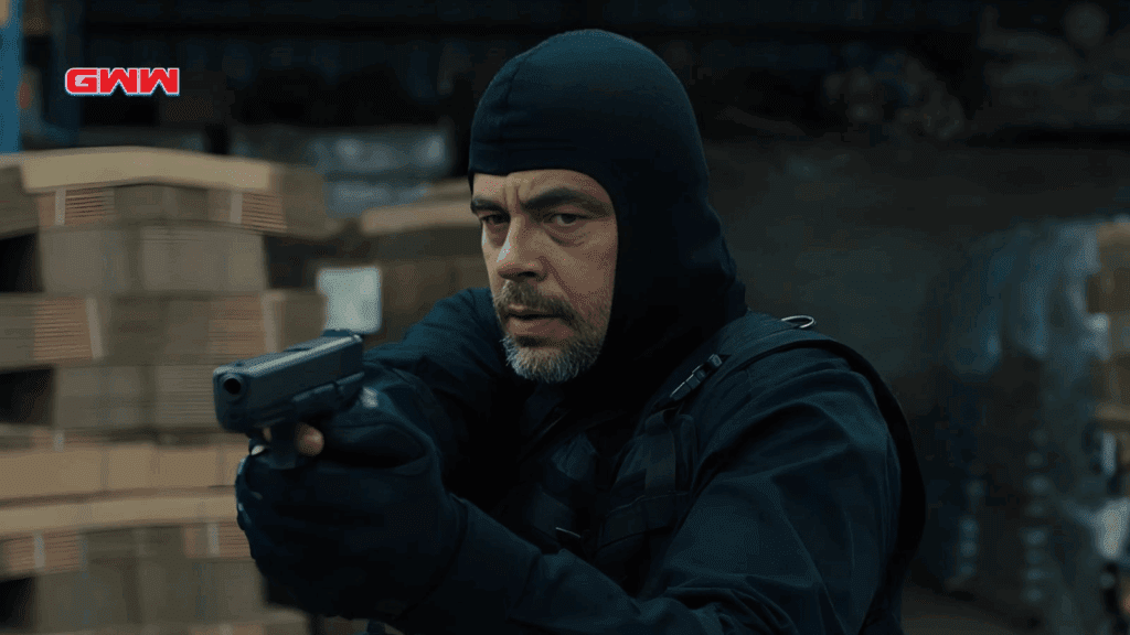Benicio Del Toro aiming gun with intense face in Sicario tactical scene
