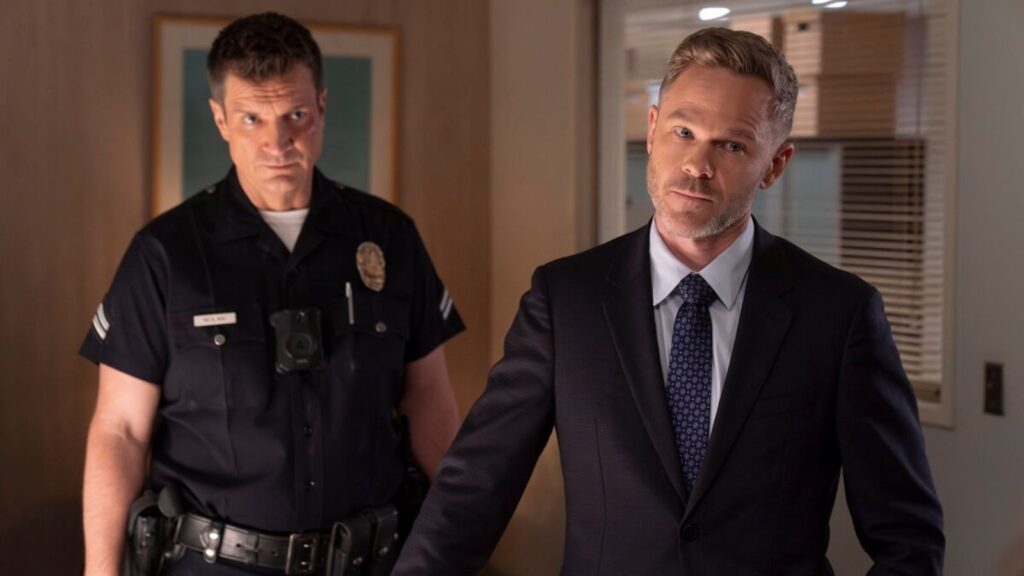 Nathan Fillion as John Nolan with Shawn Ashmore as Wesley Evers in The Rookie season 7