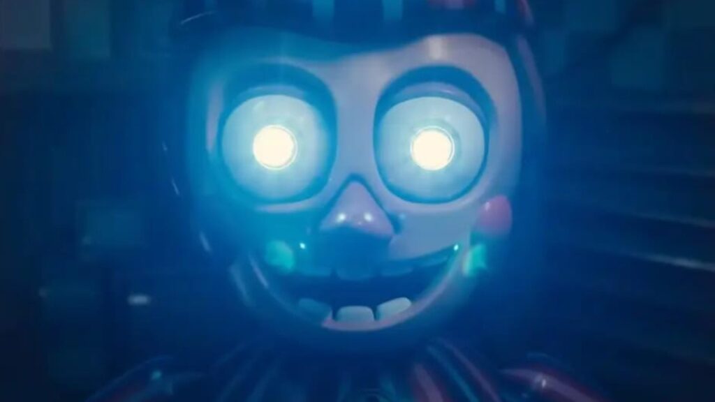 Toy Bonnie animatronic voiced by Matthew Patrick glowing eerily in blue light in Nights at Freddy’s 2