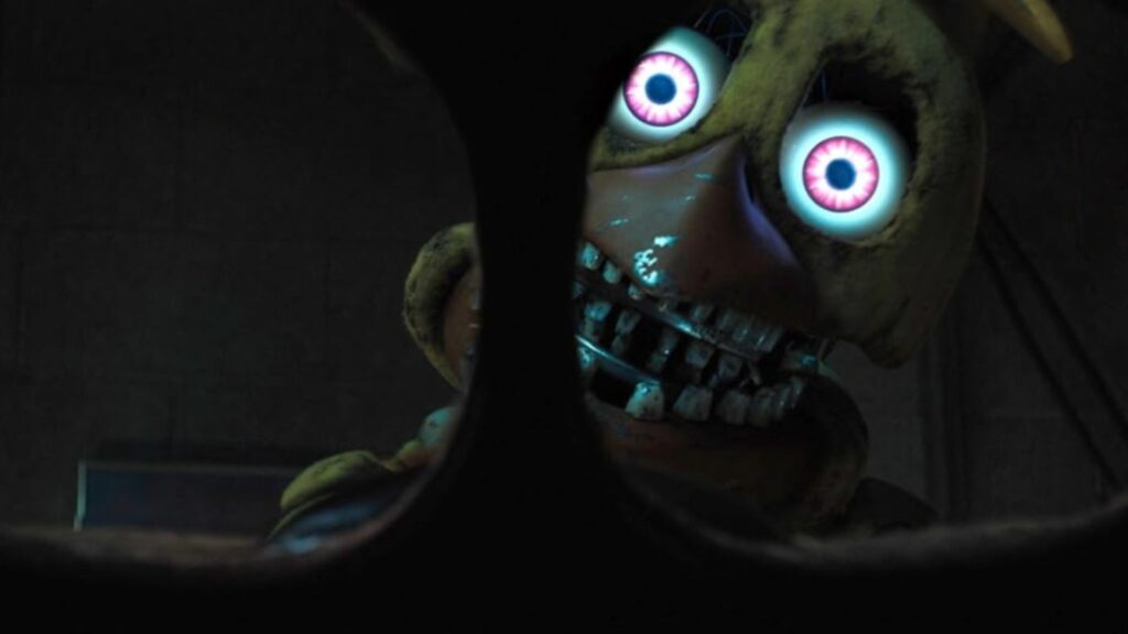 Toy Chica animatronic voiced by Megan Fox menacingly stares through darkness in Five Nights at Freddy’s 2