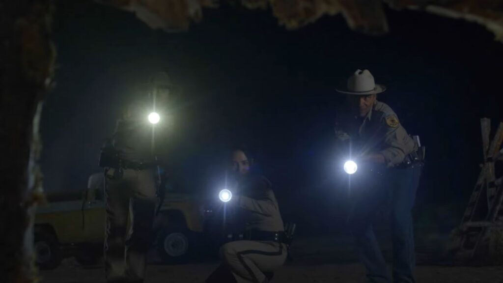 Jessica Matten and Zahn McClarnon explore cave in Dark Winds Season 4