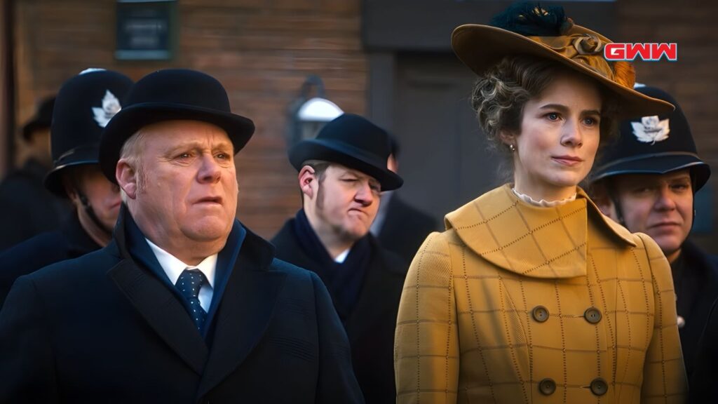 Thomas Craig and Hélène Joy in Murdoch Mysteries scene with officers