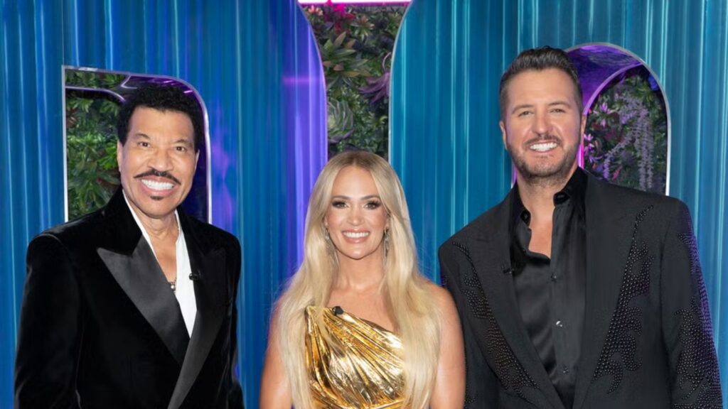 Lionel Richie Carrie Underwood and Luke Bryan smiling on American Idol set