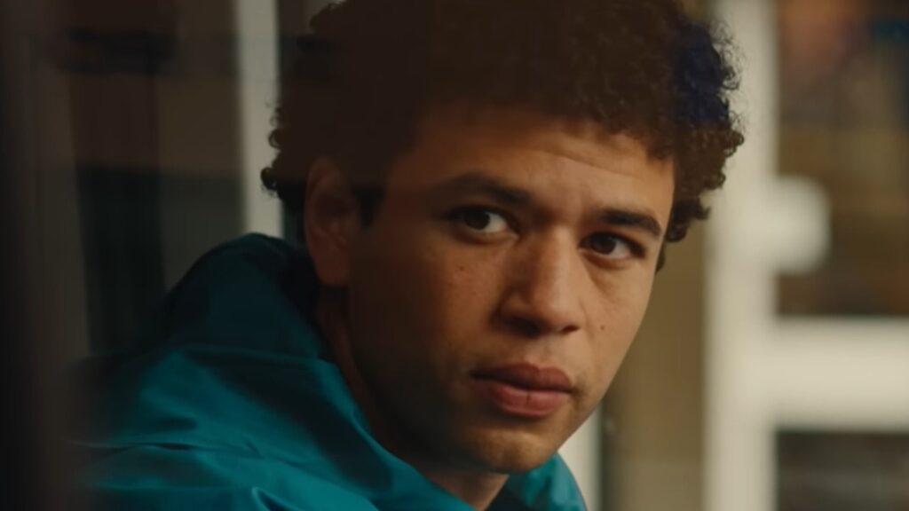 Tosin Cole as Michael looks tense and focused indoors in Supacell