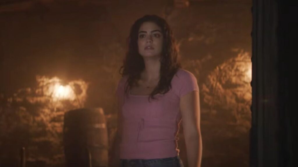 Sadie Laflamme-Snow standing in dimly lit room The Way Home Season 4