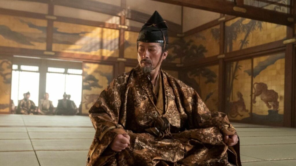 Hiroyuki Sanada as Lord Toranaga seated in traditional Japanese room scene, from Shogun season 1