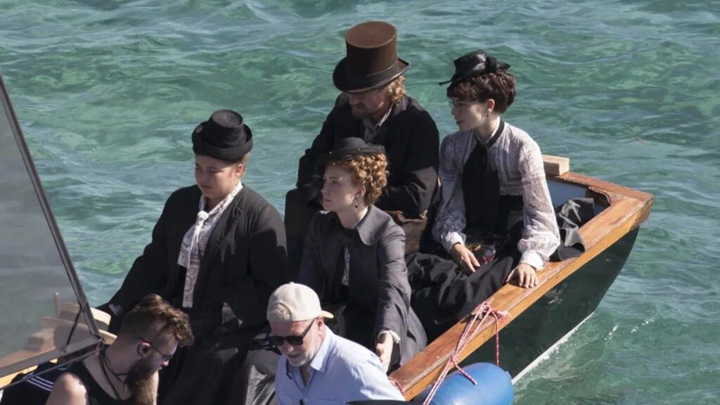 Melika Foroutan as Sophia traveling on boat in The Empress Season 3