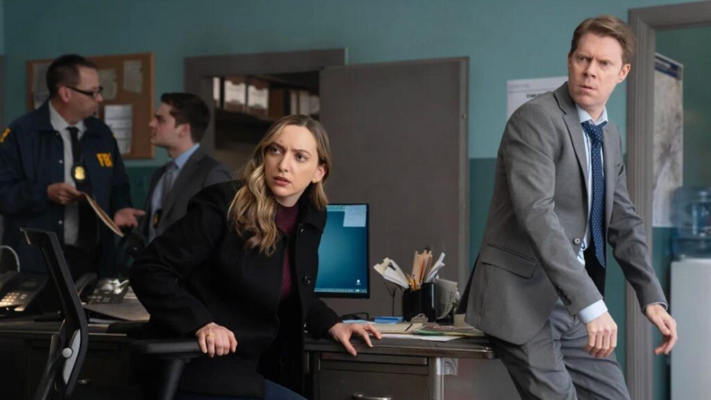 Alexandra Ruddy and Tim Baltz in Deli Boys season 1.