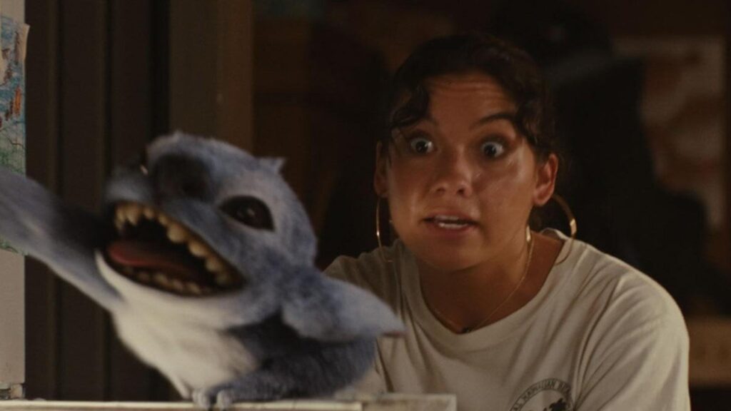 Sydney Agudong as Nani with Stitch in Lilo and Stitch