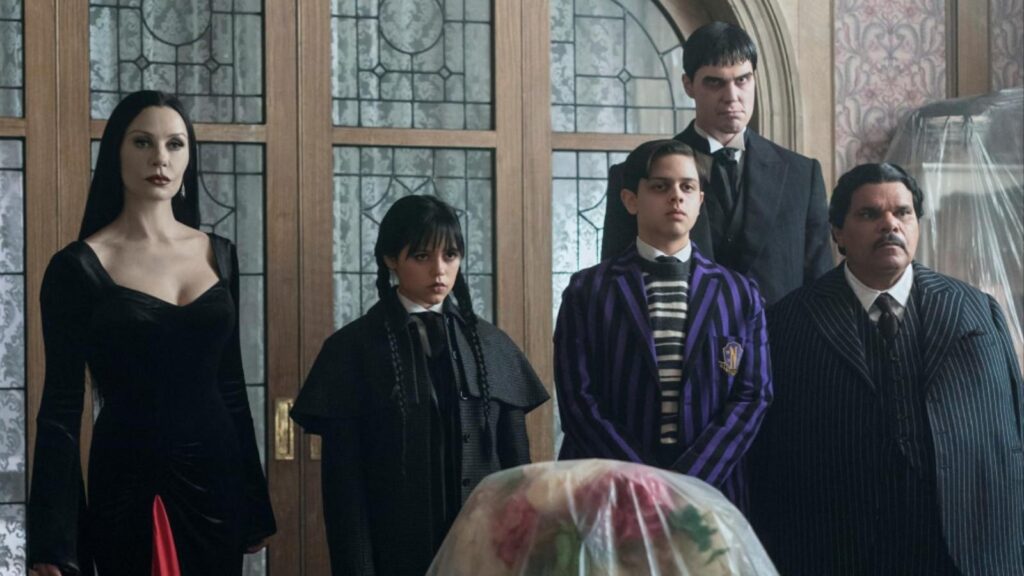 Catherine Zeta-Jones as Morticia Addams with Jenna Ortega Wednesday family scene in Wednesday season 3
