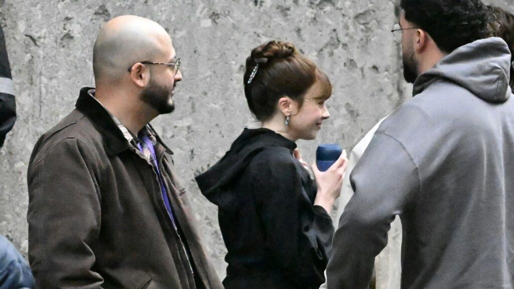 Claudia Jessie as Eloise Bridgerton behind the scenes filming candid moment, from Bridgerton season 5