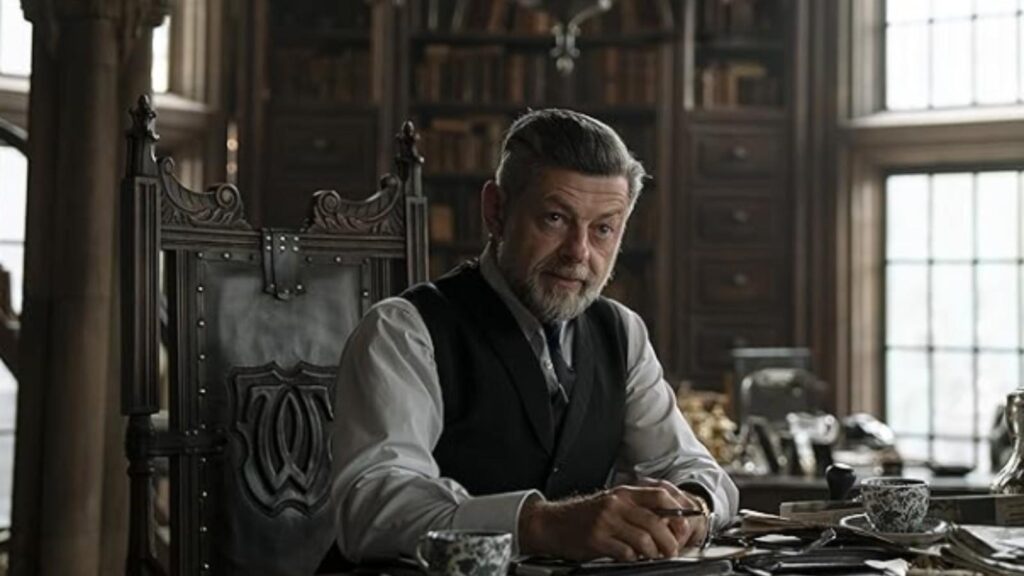 Andy Serkis as Alfred Pennyworth in The Batman speaking inside Wayne Manor library