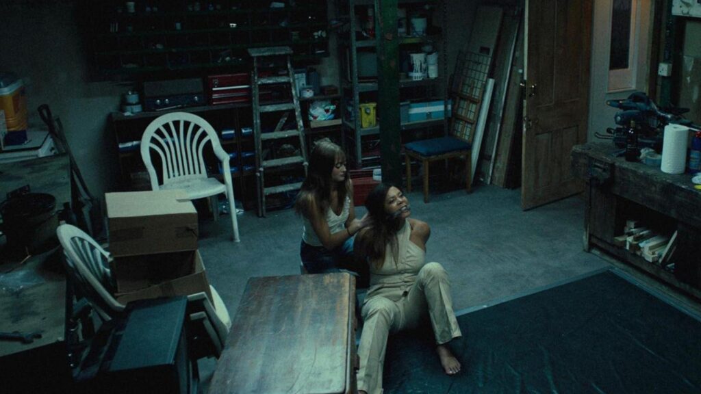 Ella Purnell as Rhiannon and Nicôle Lecky as Julia Blenkinsopp in Sweetpea.