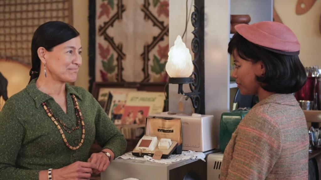 Kimberly Guerrero and Taylour Paige in IT: Welcome to Derry at pawn shop