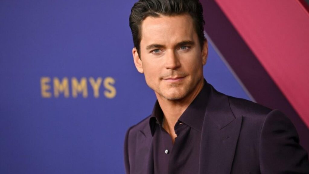 Matt Bomer at the Emmy Awards in a dark suit