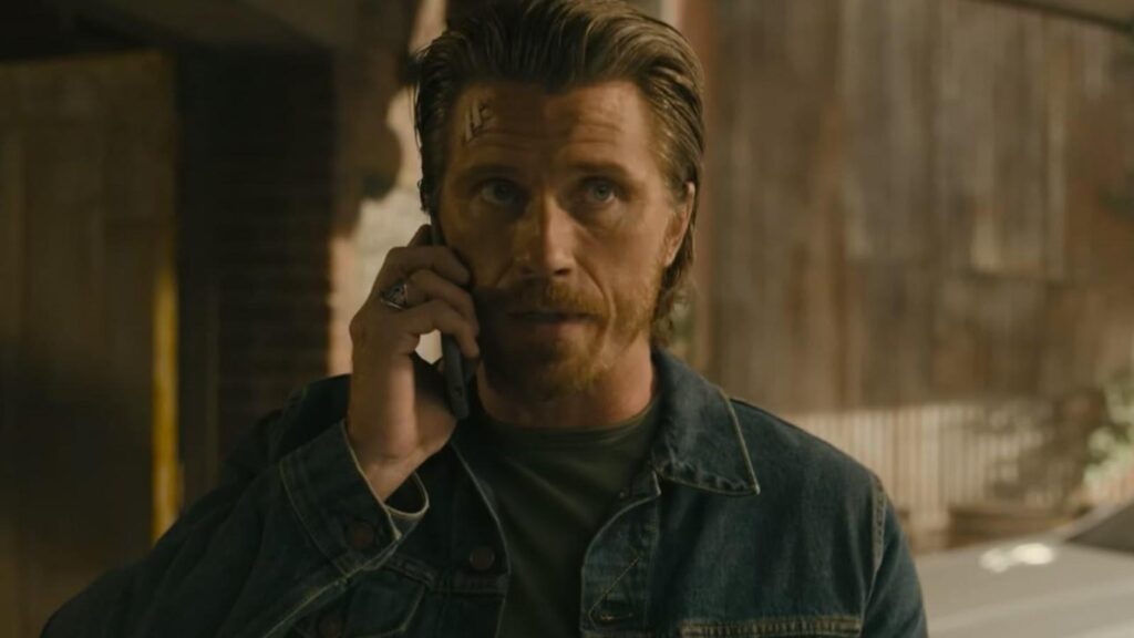 Garrett Hedlund takes a phone call in a tense Tulsa King season 3 scene
