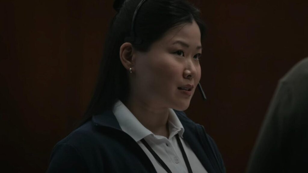 Eden Lee talks through headset during tense scene