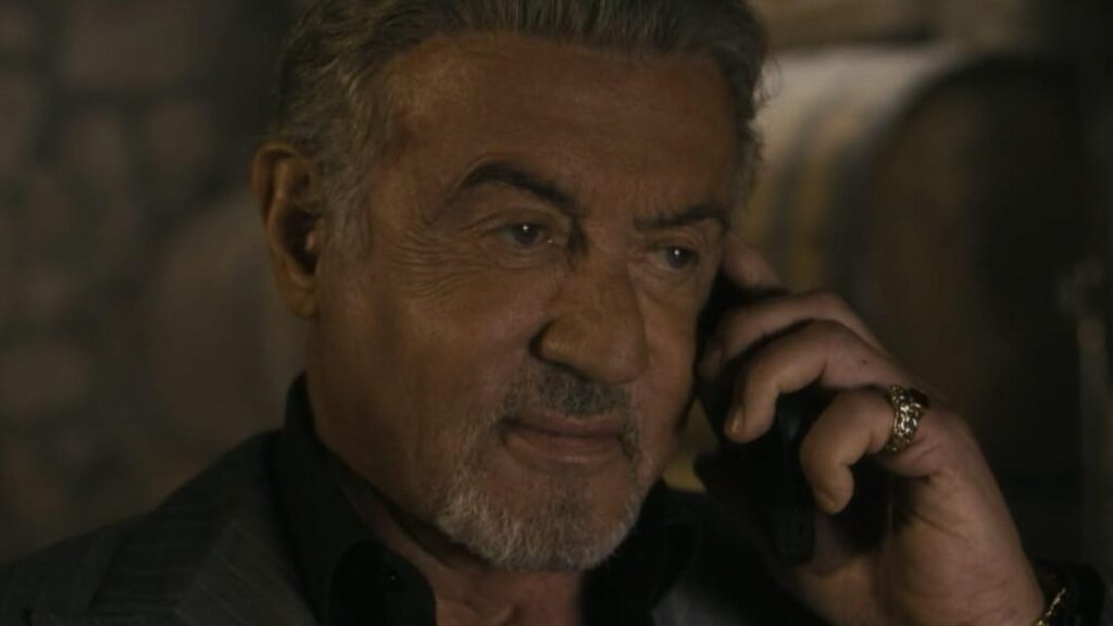 Sylvester Stallone as Dwight Manfredi takes a serious call in Tulsa King season 3