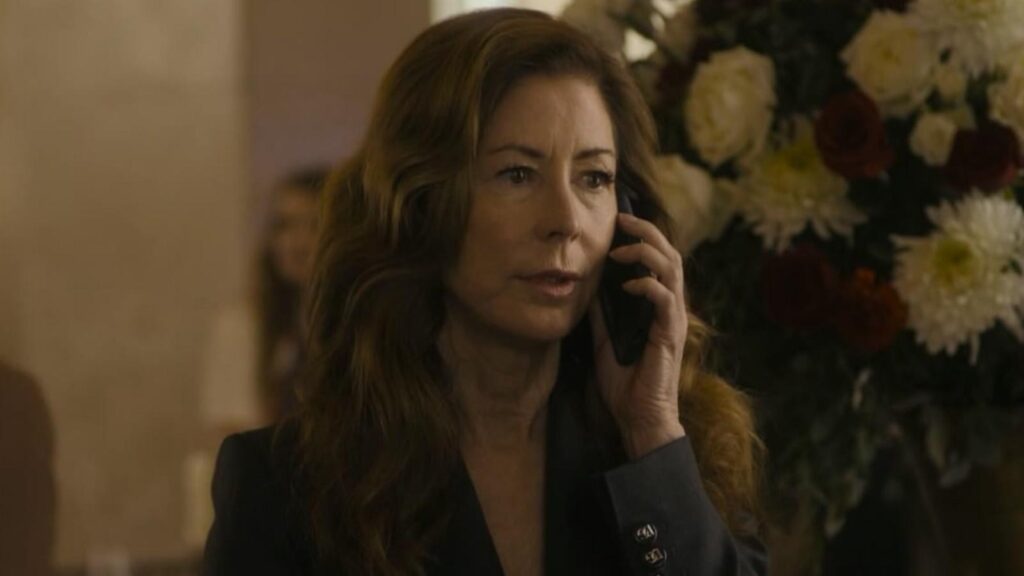 Annabella Sciorra as Joanne Manfredi listens on phone in Tulsa King season 3