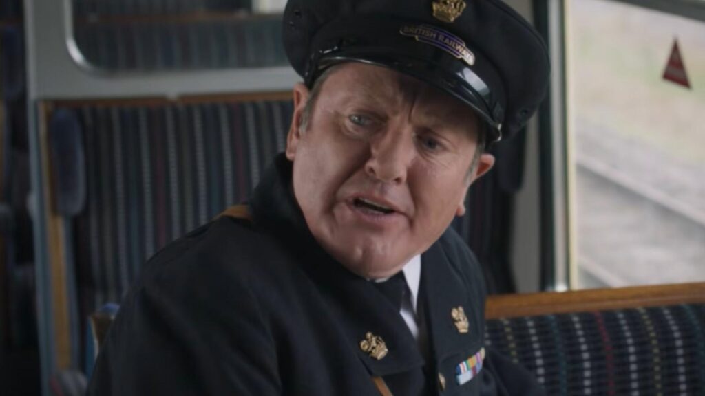Bradley Hall as Larry Peters speaking in railway uniform, from Grantchester Season 11 trailer