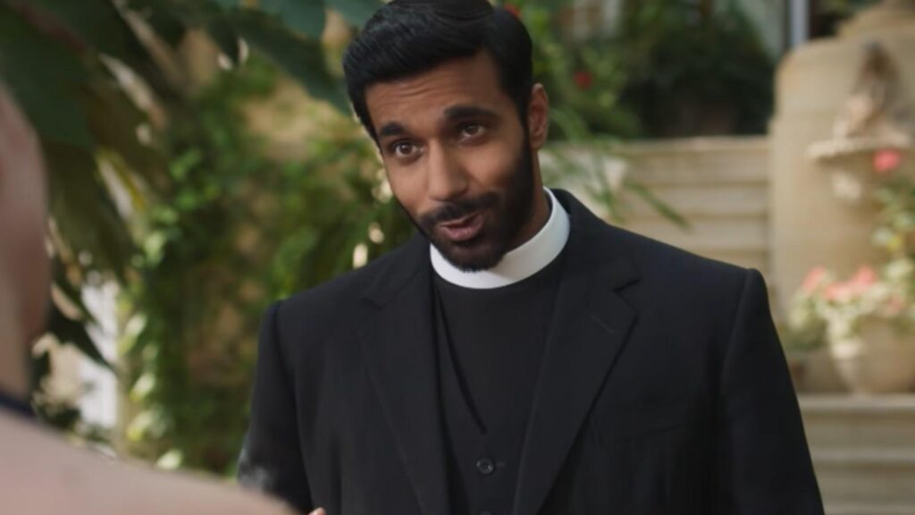 Rishi Nair as Alphy Kottaram talking outside the vicarage, from Grantchester Season 11 trailer