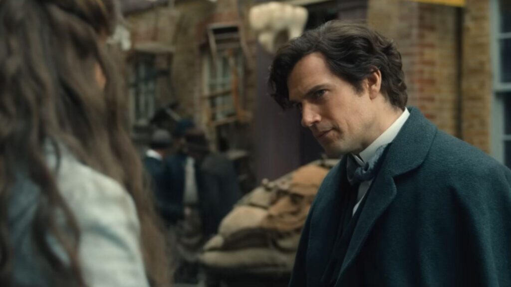 Henry Cavill speaks seriously with Millie Bobby Brown during tense mystery moment, from Enola Holmes 3