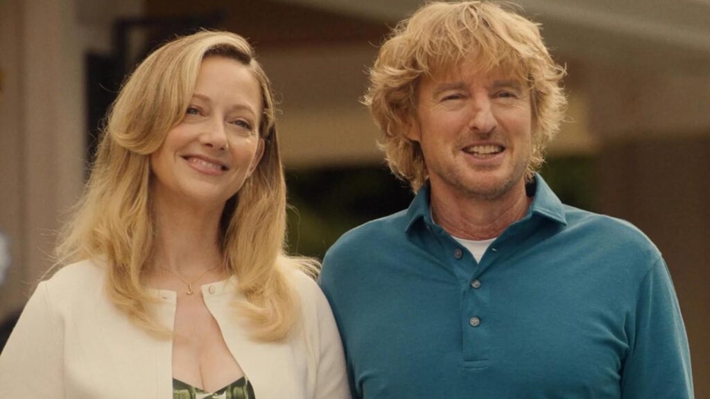Judy Greer as Amber-Linn smiles beside Owen Wilson as Pryce in Stick series