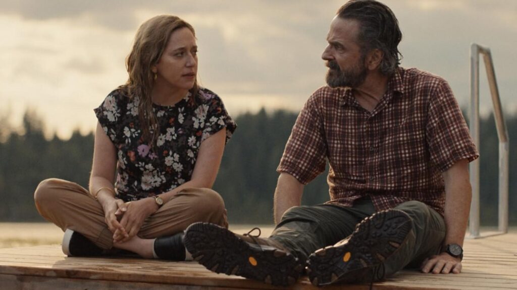 Mariana Treviño as Elena talks with Marc Maron as Mitts by the lake in Stick season 1