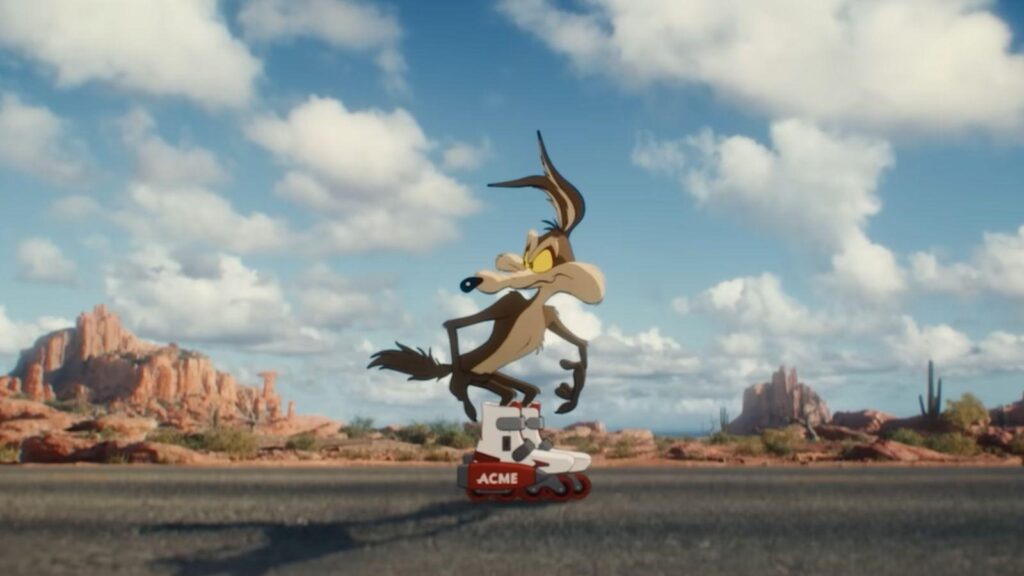 Wile E Coyote rides Acme rocket skates in desert scene, from Coyote vs Acme