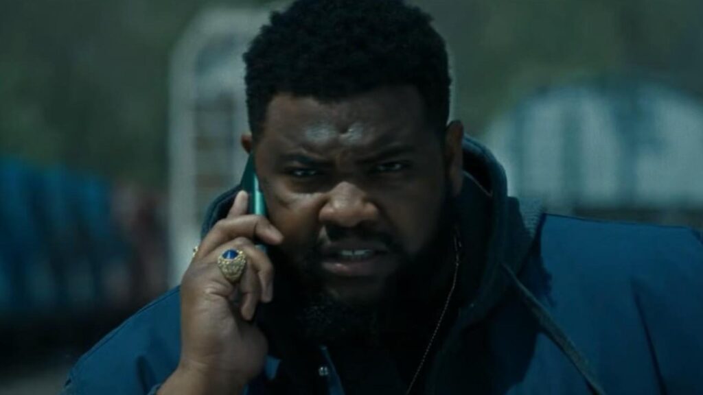 Tobi Bamtefa as Bunny Washington talking on phone with serious expression in Mayor Of Kingstown Season 4