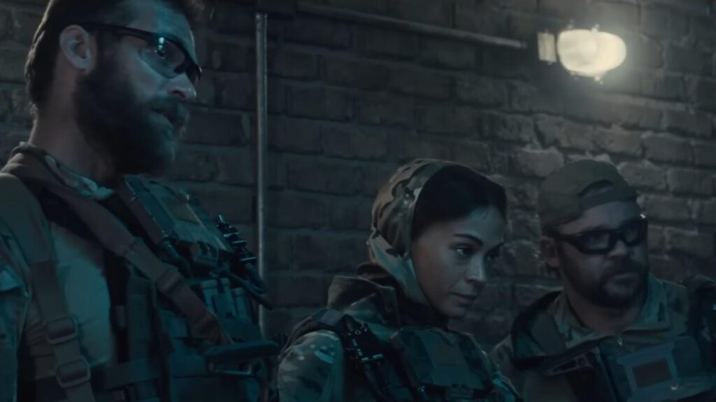 Jill Wagner as Bobby and LaMonica Garrett as Tucker in tactical scene, from Lioness Season 3