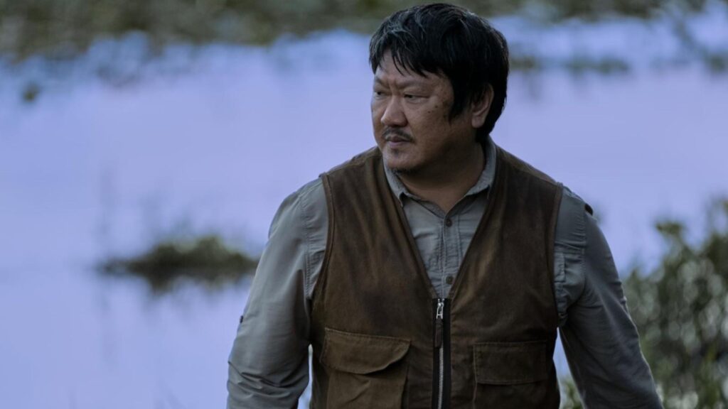 Benedict Wong as Da Shi investigates mysteries beside remote lakeside setting, from 3 Body Problem