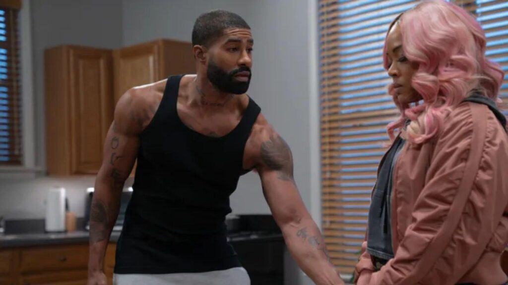 Skyh Black as Amp and Candace Maxwell as Dime share emotional conversation inside apartment kitchen, from All The Queen’s Men season 5