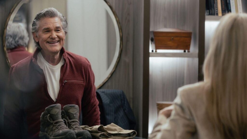 Kurt Russell smiles during conversation scene in The Madison drama, from The Madison season 1