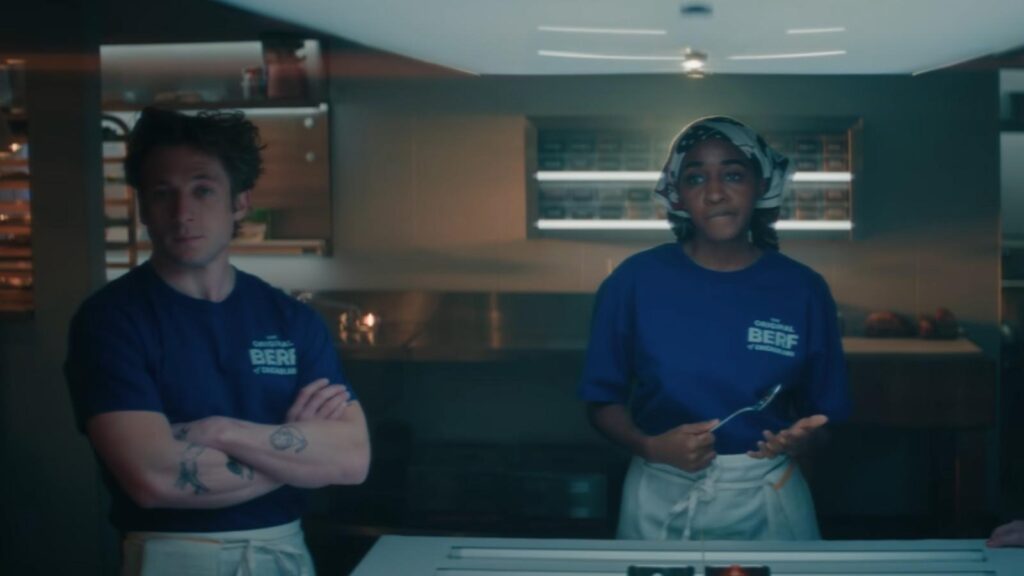 Jeremy Allen White and Ayo Edebiri face kitchen staff meeting, from The Bear Season 5