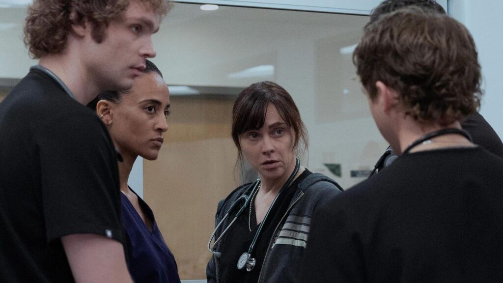 Lucas Iverson, Alexandra Metz, and Fiona Dourif in The Pitt season 2.