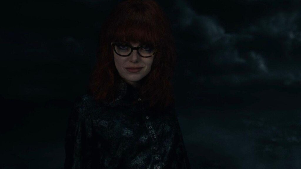 Emma Stone as Estella close up moody night villain portrait, from Cruella