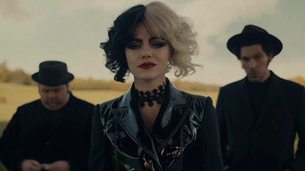 Emma Stone as Estella intense confrontation face touching dramatic scene, from Cruella