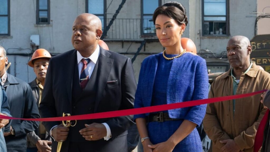 Forest Whitaker and Lucy Fry attending neighborhood ribbon cutting ceremony in Godfather of Harlem Season 4