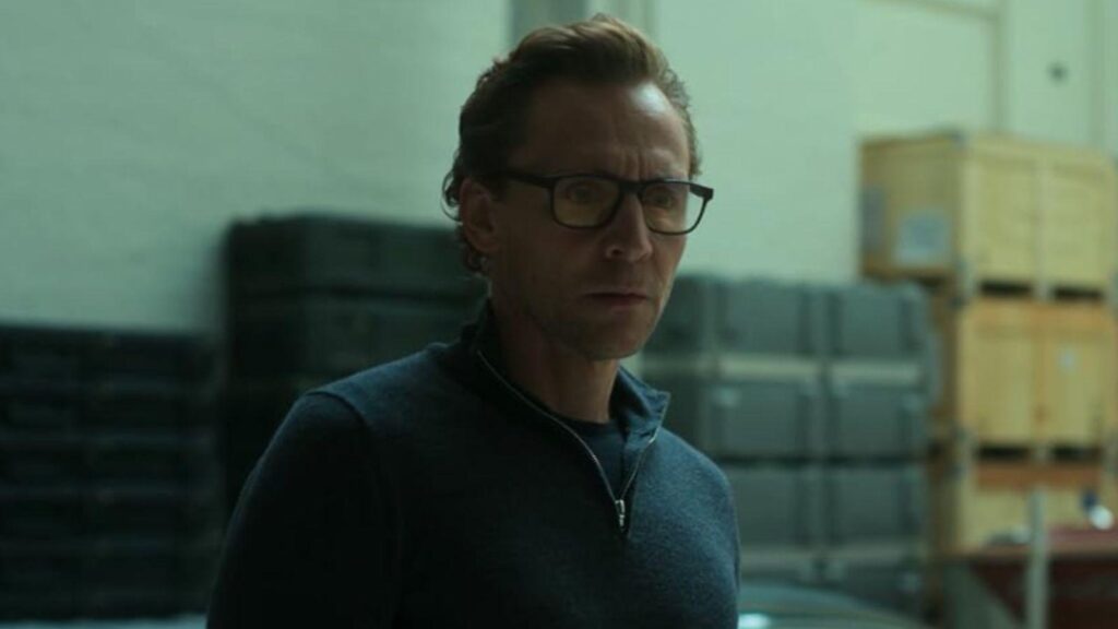 Tom Hiddleston as Jonathan Pine in tense warehouse from The Night Manager season 2