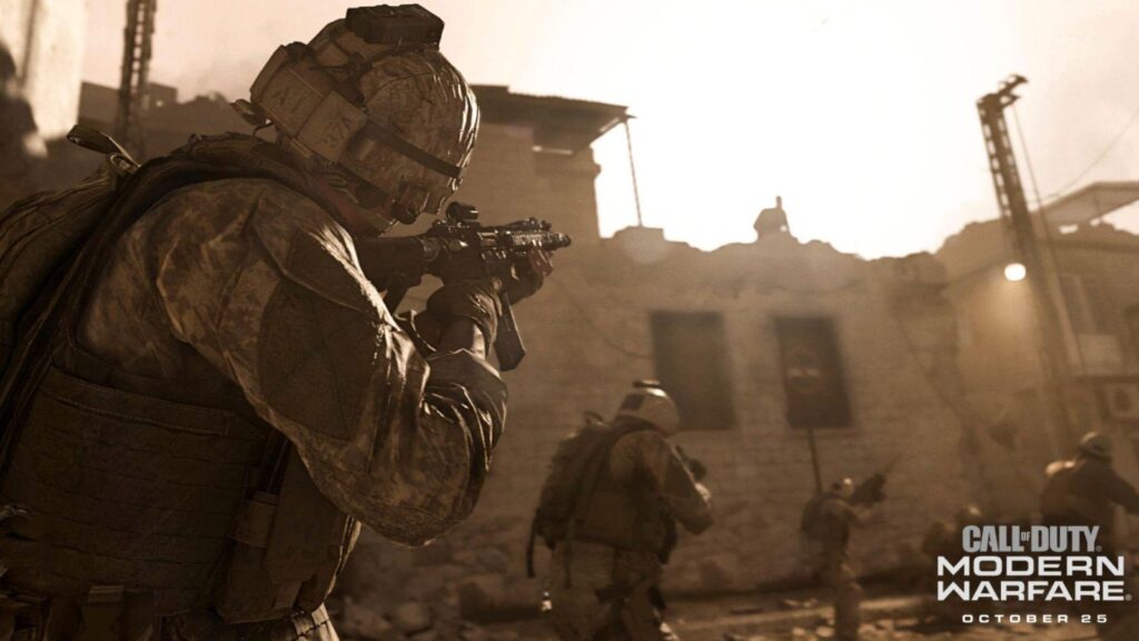 Armed soldiers move through a destroyed city during a combat mission in Call of Duty: Modern Warfare.