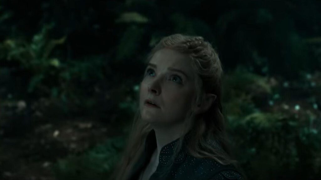 Morfydd Clark as Galadriel watches the night sky with concern, from The Lord of the Rings: The Rings of Power Season 3