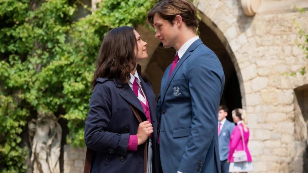 Damian Hardung as James, and Harriet Herbig-Matten as Ruby share a romantic moment outside Maxton Hall school grounds in Maxton Hall Season 2